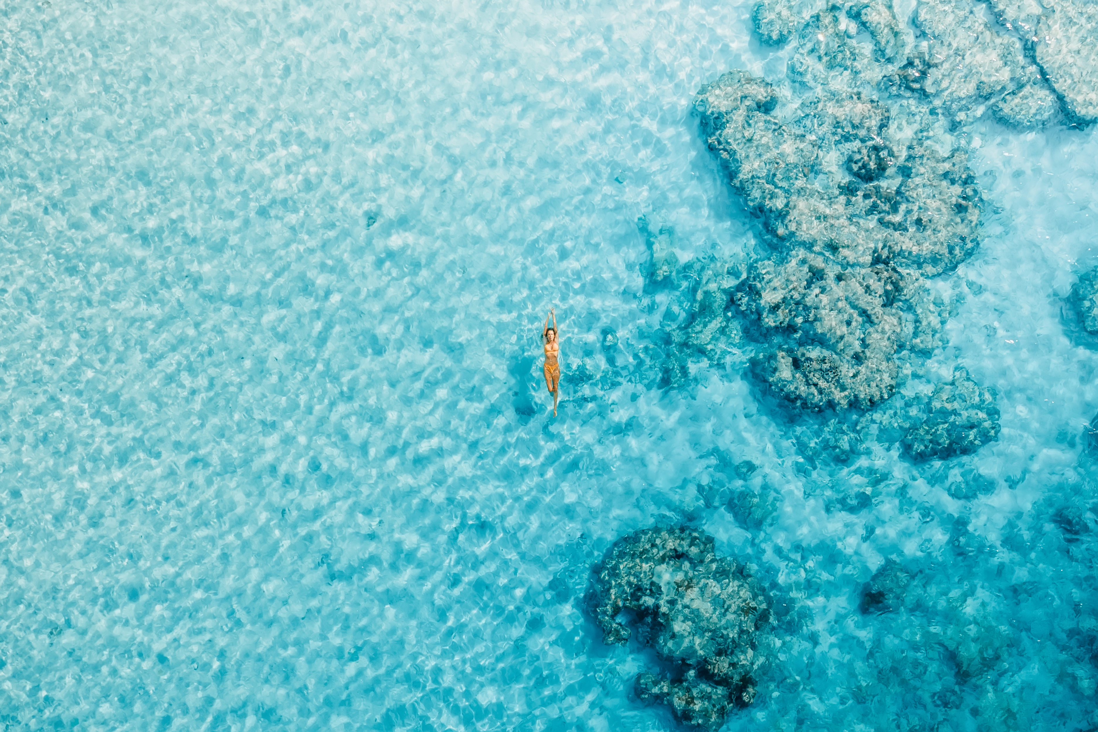 Tahiti & the Caribbean — overwater bungalows and turquoise water