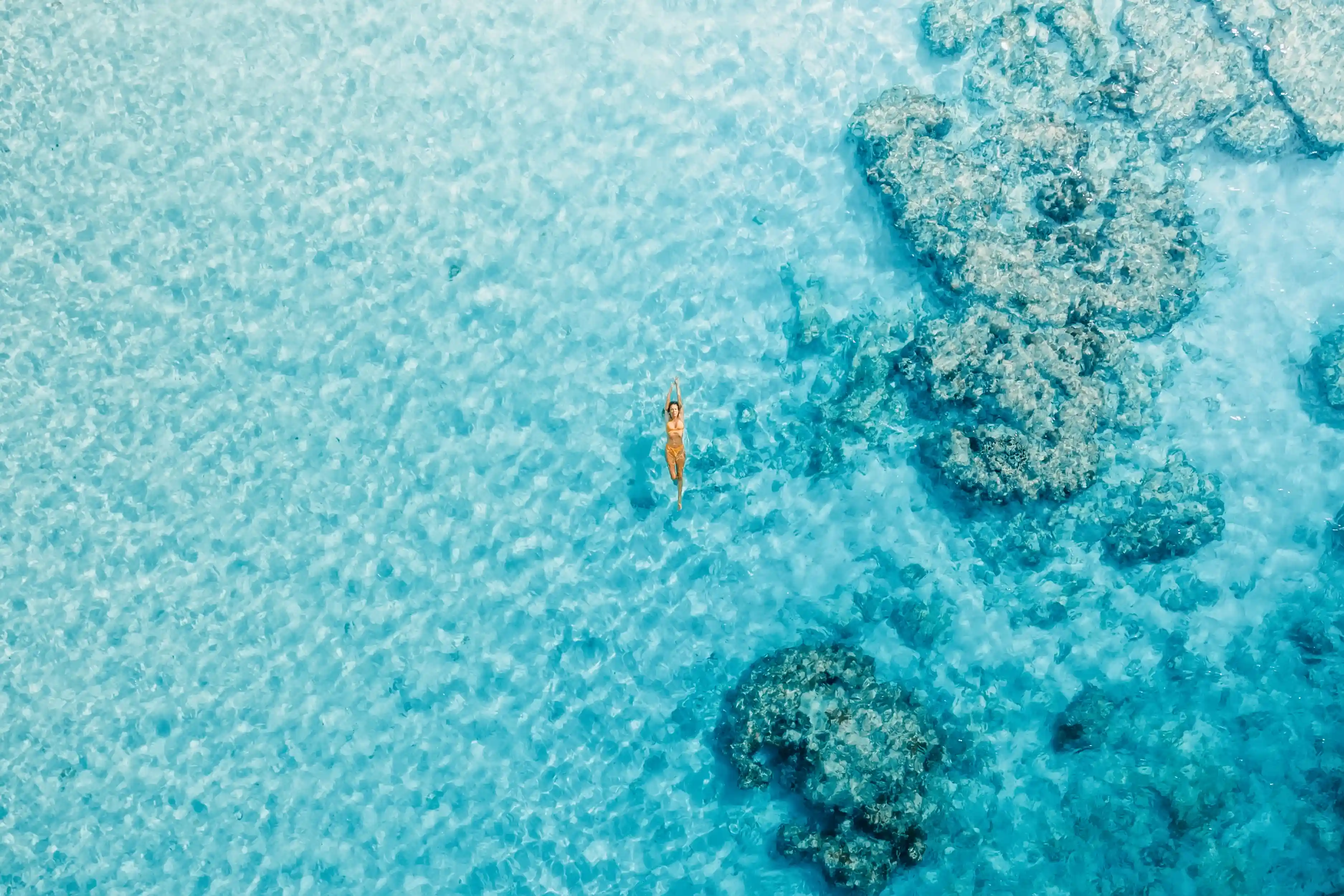 Tahiti & the Caribbean — overwater bungalows and turquoise water